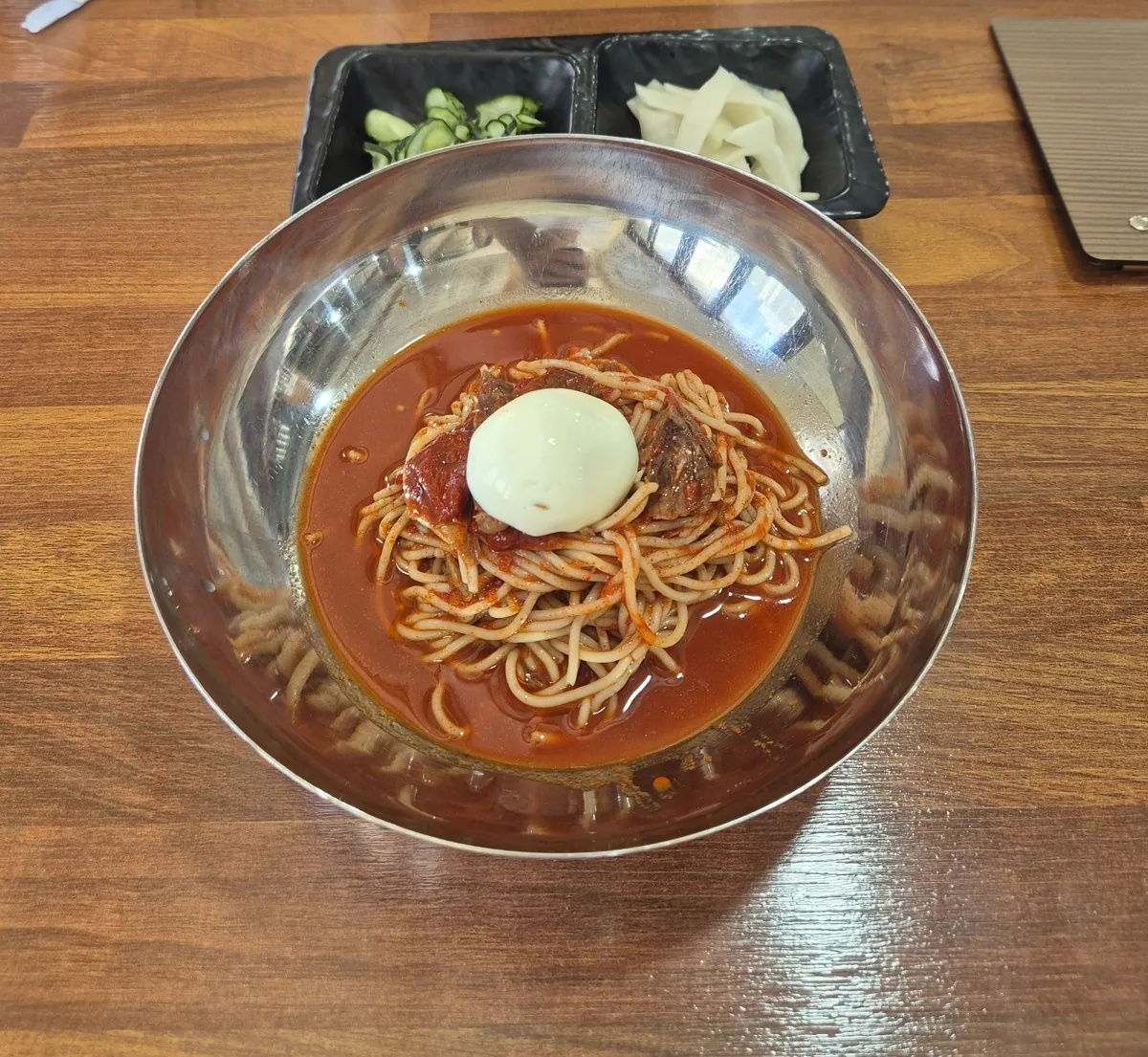 Buda-myeonok bibim-naengmyeon; article describes this exact dish in the first-person meal narrative. Article date 2026-10-08T02:50:50+09:00; image capture date unconfirmed.